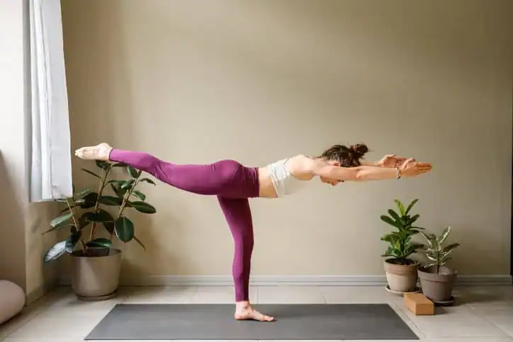 Achieving the Perfect Tone: How Often Should You Exercise for Results? 1 Woman doing Yoga exercise High Wycombe to help with toning the body.